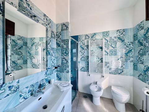 Superior Double Room, City View | Bathroom | Shower, hair dryer, towels, soap