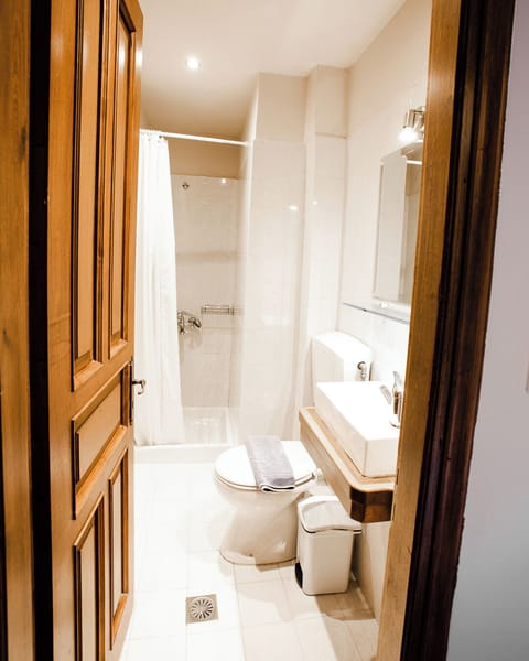 Standard Double Room | Bathroom | Shower, hair dryer, towels, soap