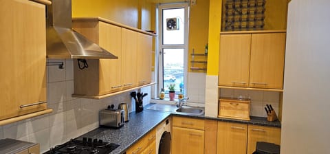 Standard Apartment, Partial Sea View | Private kitchen | Electric kettle, toaster