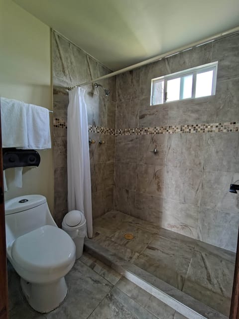 Double Room, Garden View | Bathroom | Shower, free toiletries, towels, soap