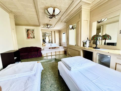 Economy Quadruple Room, Multiple Beds, Non Smoking, Private Bathroom | Blackout drapes, soundproofing, WiFi (free), bed sheets