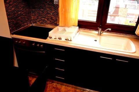 Deluxe Villa | Private kitchen | Fridge, stovetop, electric kettle, toaster