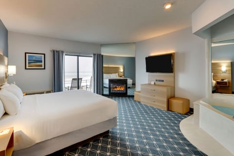 Deluxe Room, 1 King Bed, Jetted Tub, Patio, Lake View | In-room safe, desk, iron/ironing board, free WiFi