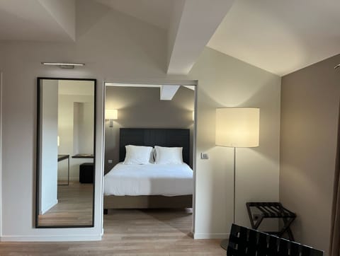 Suite | Premium bedding, blackout drapes, soundproofing