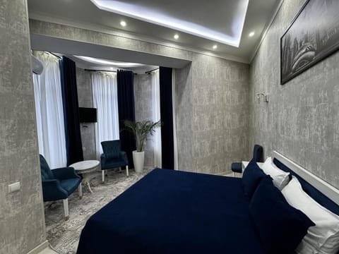 Double Room, City View | Minibar, in-room safe, desk, laptop workspace