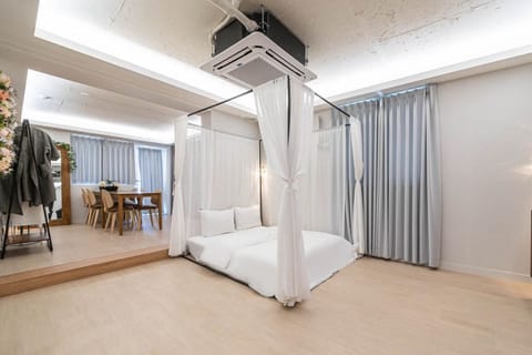 Party Room | Premium bedding, individually decorated, individually furnished, desk