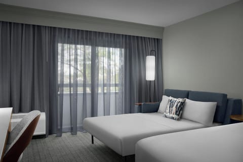 Premium bedding, down comforters, pillowtop beds, in-room safe