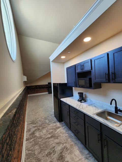 King - 5th Floor Suite | Private kitchen | Coffee/tea maker