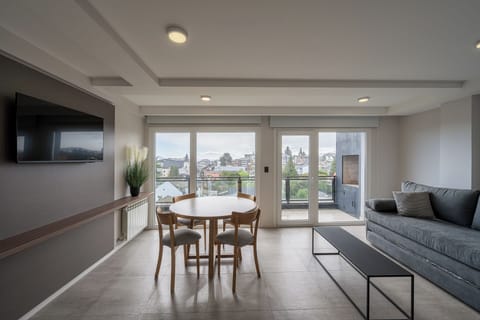 Deluxe Apartment, 1 Bedroom, Balcony, City View | Living area | 40-inch Smart TV with cable channels, Netflix, pay movies