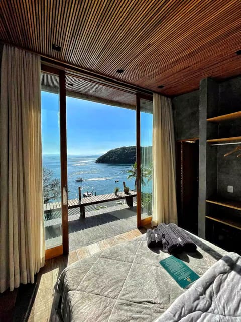 Deluxe Double Room, Sea View | In-room safe, blackout drapes, free WiFi, bed sheets