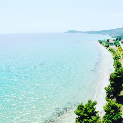 Beach nearby, white sand, sun loungers, beach umbrellas