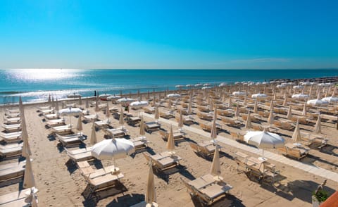 Private beach nearby, white sand, sun loungers, beach umbrellas