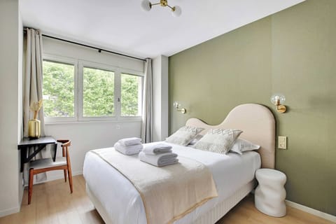 Apartment | Laptop workspace, iron/ironing board, bed sheets
