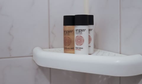 Apartment, 1 Double Bed with Sofa bed, Balcony, Courtyard View | Bathroom | Hair dryer, towels, soap, shampoo