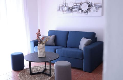 Apartment, 1 Double Bed with Sofa bed, Balcony, Courtyard View | Living area | 32-inch Smart TV with digital channels