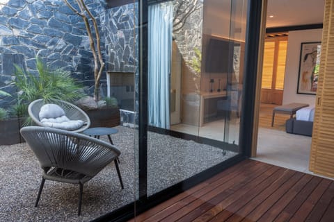 Junior Room | Living area | 55-inch Smart TV with satellite channels