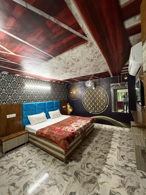 Desk, laptop workspace, bed sheets