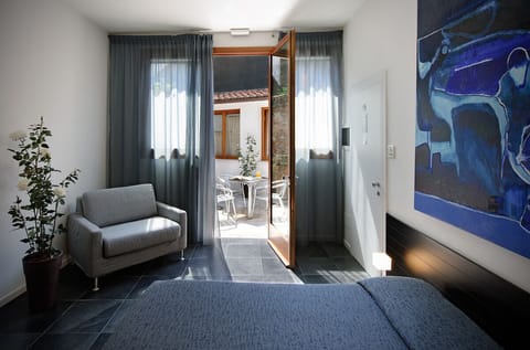 Suite, 2 Bedrooms, Kitchenette, Courtyard Area | Terrace/patio