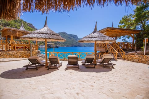 Private beach, free beach cabanas, sun loungers, beach umbrellas