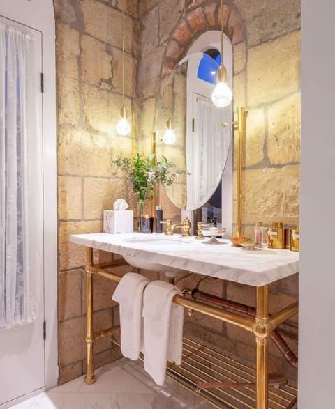 Luxury Suite, 1 King Bed, Balcony, Mountain View | Bathroom | Free toiletries, hair dryer, slippers, towels