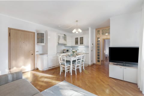 Family Apartment, Multiple Bedrooms (Riva's Garden Home) | Living area | Flat-screen TV