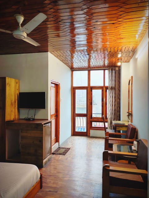 Deluxe Double Room, Balcony, River View | Individually decorated, individually furnished, desk, laptop workspace