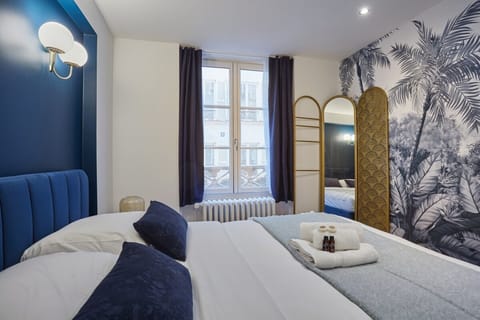 Apartment | Laptop workspace, iron/ironing board, bed sheets