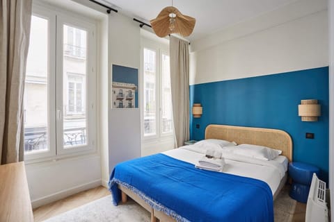 Apartment | Laptop workspace, iron/ironing board, bed sheets