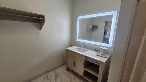 Shower, towels, soap, shampoo