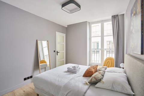 Apartment | Laptop workspace, iron/ironing board, bed sheets