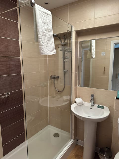 Shower, free toiletries, hair dryer, towels