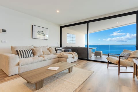 Comfort Condo, Balcony, Sea View | Living area | Flat-screen TV