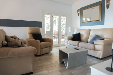 Villa | Living area | Flat-screen TV