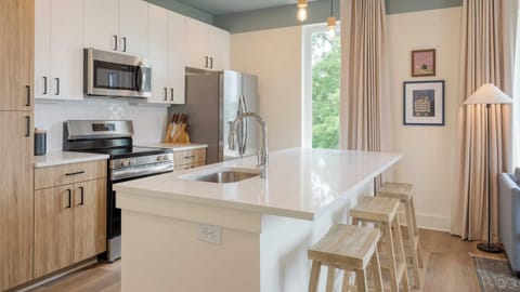 4 Bedroom Suite w/ Balcony | Private kitchen | Full-size fridge, microwave, oven