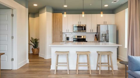 4 Bedroom Suite w/ Balcony | Living room | 55-inch Smart TV with satellite channels, Netflix, Hulu