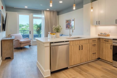 1 Bedroom Suite w/ Balcony | Private kitchen | Full-size fridge, microwave, oven