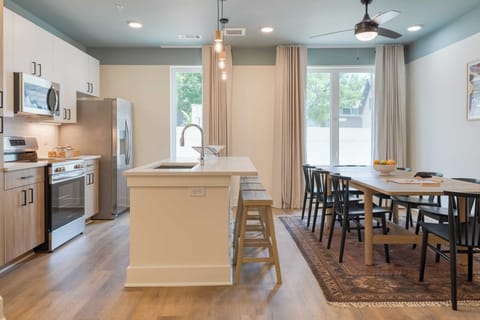 Suite, 3 Bedrooms | Private kitchen | Full-size fridge, microwave, oven