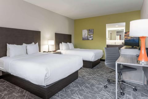 Pillowtop beds, desk, iron/ironing board, free cribs/infant beds