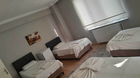 Deluxe Quadruple Room, Balcony, City View | Soundproofing, free WiFi