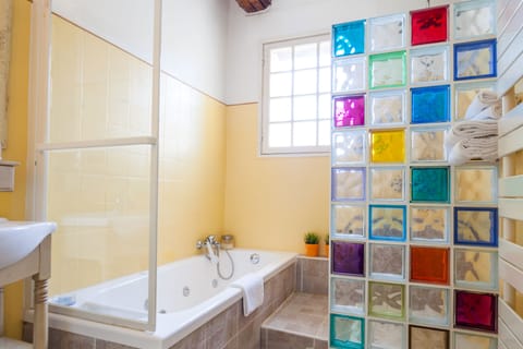 Suite | Bathroom | Hair dryer, bathrobes, towels