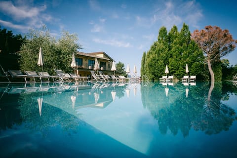 2 outdoor pools, open 8:00 AM to 8:00 PM, pool umbrellas, sun loungers