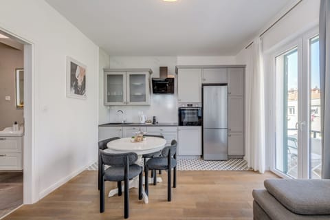 Deluxe Apartment, Balcony | Private kitchen | Coffee/tea maker