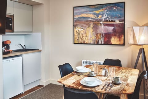 1 Bedroom Apartment | Living area | TV