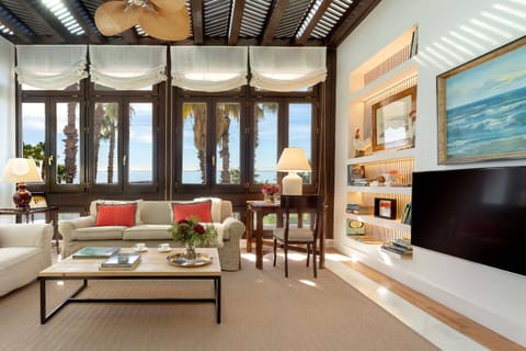 Apartment (2 Bedrooms) | Living room | 52-inch Smart TV with satellite channels