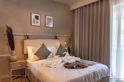 In-room safe, desk, laptop workspace, blackout drapes