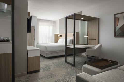 Desk, laptop workspace, iron/ironing board, free cribs/infant beds