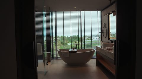 Borea Penthouse | Bathroom | Hair dryer, slippers, towels, soap