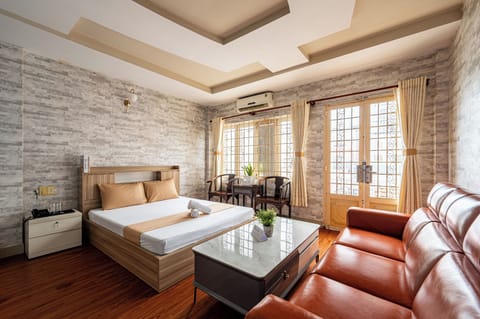 Family Triple Room, City View | Desk, free WiFi