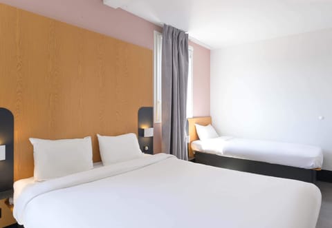 Quadruple Room | Premium bedding, desk, blackout drapes, soundproofing