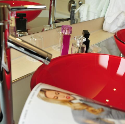 Studio Suite | Bathroom | Hair dryer, bathrobes, towels, soap